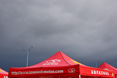 15-July-2011;28mm;APRC;Asia-Pacific-Rally-Championship;International-Rally-Of-Whangarei;NZ;New-Zealand;Northland;Rally;Soueast-Motor-Kumho-Team;Whangarei;auto;clouds;detail;garage;motorsport;pre‒event;racing;service-park;sky;tent;wide-angle