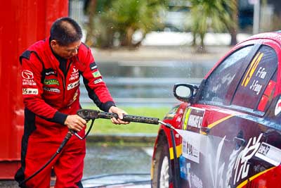 15-July-2011;APRC;Asia-Pacific-Rally-Championship;International-Rally-Of-Whangarei;NZ;New-Zealand;Northland;Rally;Whangarei;auto;garage;mechanic;motorsport;portrait;pre‒event;racing;service-park;telephoto;water-spray