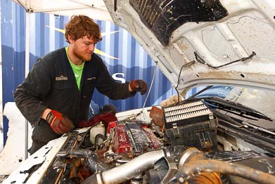 8;15-July-2011;8;APRC;Asia-Pacific-Rally-Championship;International-Rally-Of-Whangarei;Mitsubishi-Lancer-Evolution-IX;NZ;New-Zealand;Northland;Rally;Whangarei;auto;engine-bay;garage;mechanics;motorsport;portrait;pre‒event;racing;service-park;wide-angle