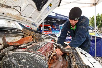 8;15-July-2011;8;APRC;Asia-Pacific-Rally-Championship;International-Rally-Of-Whangarei;Mitsubishi-Lancer-Evolution-IX;NZ;New-Zealand;Northland;Rally;Whangarei;auto;engine-bay;garage;mechanics;motorsport;portrait;pre‒event;racing;service-park;wide-angle