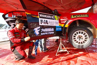 19;15-July-2011;19;APRC;Asia-Pacific-Rally-Championship;Fan-Fan;International-Rally-Of-Whangarei;Junwei-Fang;Mitsubishi-Lancer-Evolution-X;NZ;New-Zealand;Northland;Rally;Soueast-Motor-Kumho-Team;Whangarei;auto;garage;motorsport;pre‒event;racing;service-park;wide-angle