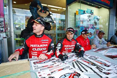 15-July-2011;APRC;Asia-Pacific-Rally-Championship;International-Rally-Of-Whangarei;NZ;New-Zealand;Northland;Rally;Rifat-Sungkar;Scott-Beckwith;Whangarei;auto;autograph;fans;garage;motorsport;portrait;pre‒event;racing;spectators;start;wide-angle