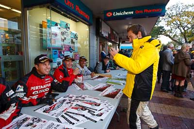 15-July-2011;APRC;Asia-Pacific-Rally-Championship;Chris-Atkinson;Hade-Mboi;International-Rally-Of-Whangarei;NZ;New-Zealand;Northland;Rally;Rifat-Sungkar;Subhan-Aksa;Topshot;Whangarei;auto;autograph;fans;garage;motorsport;portrait;pre‒event;racing;spectators;start;wide-angle