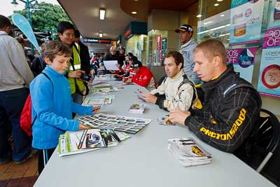 15-July-2011;APRC;Alister-McRae;Asia-Pacific-Rally-Championship;Chris-Atkinson;International-Rally-Of-Whangarei;NZ;New-Zealand;Northland;Rally;Whangarei;auto;autograph;fans;garage;motorsport;portrait;pre‒event;racing;spectators;start;wide-angle