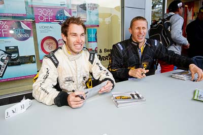 15-July-2011;APRC;Alister-McRae;Asia-Pacific-Rally-Championship;Chris-Atkinson;International-Rally-Of-Whangarei;NZ;New-Zealand;Northland;Rally;Whangarei;auto;autograph;fans;garage;motorsport;portrait;pre‒event;racing;spectators;start;wide-angle