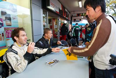 15-July-2011;APRC;Alister-McRae;Asia-Pacific-Rally-Championship;Chris-Atkinson;International-Rally-Of-Whangarei;NZ;New-Zealand;Northland;Rally;Whangarei;auto;autograph;fans;garage;motorsport;portrait;pre‒event;racing;spectators;start;wide-angle