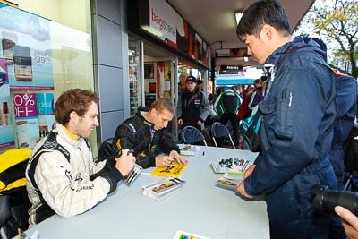 15-July-2011;APRC;Alister-McRae;Asia-Pacific-Rally-Championship;Chris-Atkinson;International-Rally-Of-Whangarei;NZ;New-Zealand;Northland;Rally;Whangarei;auto;autograph;fans;garage;motorsport;portrait;pre‒event;racing;spectators;start;wide-angle