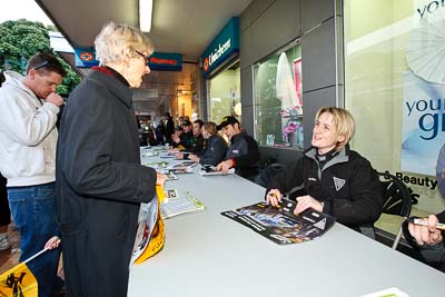 15-July-2011;APRC;Asia-Pacific-Rally-Championship;Emma-Gilmour;International-Rally-Of-Whangarei;NZ;New-Zealand;Northland;Rally;Whangarei;auto;autograph;fans;garage;motorsport;portrait;pre‒event;racing;spectators;start;wide-angle