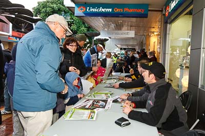 15-July-2011;APRC;Asia-Pacific-Rally-Championship;Chris-West;International-Rally-Of-Whangarei;NZ;New-Zealand;Northland;Rally;Whangarei;auto;autograph;fans;garage;motorsport;portrait;pre‒event;racing;spectators;start;wide-angle