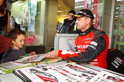 15-July-2011;APRC;Asia-Pacific-Rally-Championship;International-Rally-Of-Whangarei;NZ;New-Zealand;Northland;Rally;Scott-Beckwith;Whangarei;auto;autograph;fans;garage;motorsport;portrait;pre‒event;racing;spectators;start;wide-angle