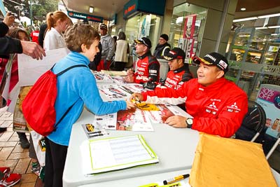 15-July-2011;APRC;Asia-Pacific-Rally-Championship;International-Rally-Of-Whangarei;NZ;New-Zealand;Northland;Rally;Subhan-Aksa;Whangarei;auto;autograph;fans;garage;motorsport;portrait;pre‒event;racing;spectators;start;wide-angle