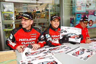 15-July-2011;APRC;Asia-Pacific-Rally-Championship;International-Rally-Of-Whangarei;NZ;New-Zealand;Northland;Rally;Rifat-Sungkar;Scott-Beckwith;Whangarei;auto;autograph;fans;garage;motorsport;portrait;pre‒event;racing;spectators;start;wide-angle