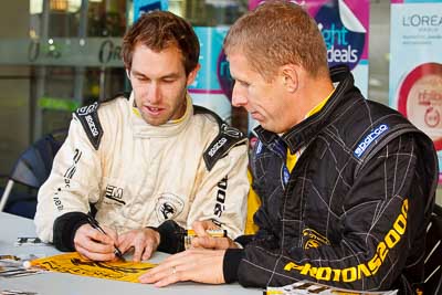 15-July-2011;APRC;Alister-McRae;Asia-Pacific-Rally-Championship;International-Rally-Of-Whangarei;NZ;New-Zealand;Northland;Rally;Whangarei;auto;autograph;fans;garage;motorsport;portrait;pre‒event;racing;spectators;start;telephoto