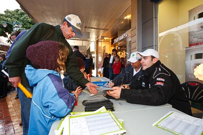 15-July-2011;APRC;Asia-Pacific-Rally-Championship;David-Green;International-Rally-Of-Whangarei;NZ;Nathan-Quinn;New-Zealand;Northland;Rally;Whangarei;auto;autograph;fans;garage;motorsport;portrait;pre‒event;racing;spectators;start;wide-angle