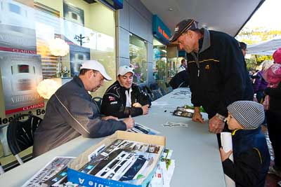 15-July-2011;APRC;Asia-Pacific-Rally-Championship;David-Green;International-Rally-Of-Whangarei;NZ;Nathan-Quinn;New-Zealand;Northland;Rally;Whangarei;auto;autograph;fans;garage;motorsport;portrait;pre‒event;racing;spectators;start;wide-angle