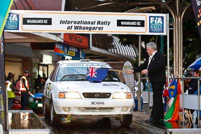 79;15-July-2011;APRC;Asia-Pacific-Rally-Championship;Graham-Lockie;International-Rally-Of-Whangarei;Kevin-Preest;NZ;New-Zealand;Northland;Rally;Suzuki-Baleno;Whangarei;auto;ceremonial-start;ceremony;garage;motorsport;pre‒event;racing;start;telephoto