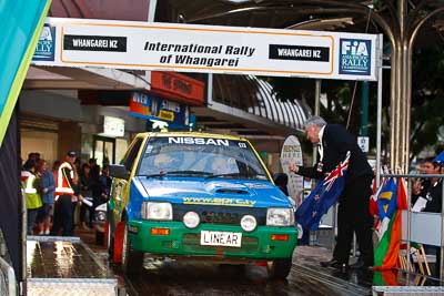 84;15-July-2011;APRC;Asia-Pacific-Rally-Championship;Daniel-Willson;International-Rally-Of-Whangarei;Michael-Young;NZ;New-Zealand;Nissan-March;Northland;Rally;Whangarei;auto;ceremonial-start;ceremony;garage;motorsport;pre‒event;racing;start;telephoto