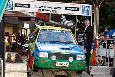 84;15-July-2011;APRC;Asia-Pacific-Rally-Championship;Daniel-Willson;International-Rally-Of-Whangarei;Michael-Young;NZ;New-Zealand;Nissan-March;Northland;Rally;Whangarei;auto;ceremonial-start;ceremony;garage;motorsport;pre‒event;racing;start;telephoto