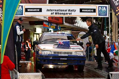 77;15-July-2011;77;APRC;Asia-Pacific-Rally-Championship;International-Rally-Of-Whangarei;Kylee-Smith;Marty-Smith;NZ;New-Zealand;Northland;Rally;Subaru-Legacy-RS;Whangarei;auto;ceremonial-start;ceremony;garage;motorsport;pre‒event;racing;start;telephoto