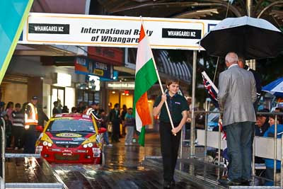 15-July-2011;APRC;Asia-Pacific-Rally-Championship;International-Rally-Of-Whangarei;NZ;New-Zealand;Northland;Rally;Whangarei;auto;ceremonial-start;ceremony;child;flag;garage;kid;motorsport;night;pre‒event;racing;start;telephoto