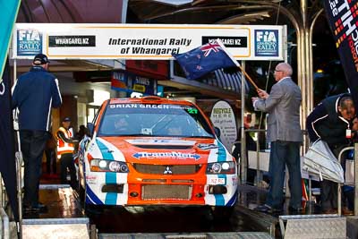 27;15-July-2011;27;APRC;Asia-Pacific-Rally-Championship;Glenn-Goldring;Glenn-Inkster;International-Rally-Of-Whangarei;Mitsubishi-Lancer-Evolution-IX;NZ;New-Zealand;Northland;Rally;Whangarei;auto;ceremonial-start;ceremony;garage;motorsport;pre‒event;racing;start;telephoto