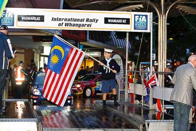 15-July-2011;APRC;Asia-Pacific-Rally-Championship;International-Rally-Of-Whangarei;NZ;New-Zealand;Northland;Rally;Whangarei;auto;ceremonial-start;ceremony;child;flag;garage;kid;motorsport;night;pre‒event;racing;start;telephoto