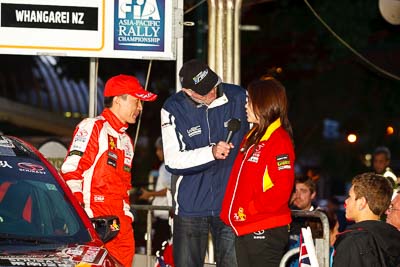 15-July-2011;APRC;Asia-Pacific-Rally-Championship;Fan-Fan;International-Rally-Of-Whangarei;NZ;New-Zealand;Northland;Rally;Whangarei;auto;ceremonial-start;ceremony;garage;motorsport;night;pre‒event;racing;start;telephoto