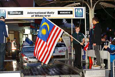 15-July-2011;APRC;Asia-Pacific-Rally-Championship;International-Rally-Of-Whangarei;NZ;New-Zealand;Northland;Rally;Whangarei;auto;ceremonial-start;ceremony;child;flag;garage;kid;motorsport;night;pre‒event;racing;start;telephoto