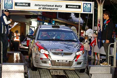 18;15-July-2011;APRC;Asia-Pacific-Rally-Championship;International-Rally-Of-Whangarei;Karamjit-Singh;NZ;New-Zealand;Northland;Proton-Cusco-Rally-Team;Proton-Satria-Neo;Rally;Vivek-Ponnusamy;Whangarei;auto;ceremonial-start;ceremony;garage;motorsport;pre‒event;racing;start;telephoto