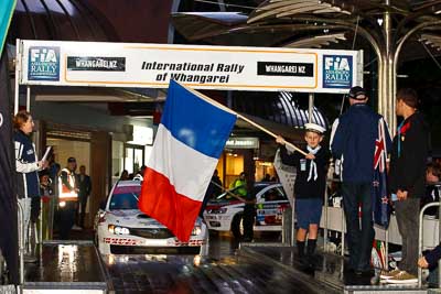 15-July-2011;APRC;Asia-Pacific-Rally-Championship;International-Rally-Of-Whangarei;NZ;New-Zealand;Northland;Rally;Whangarei;auto;ceremonial-start;ceremony;child;flag;garage;kid;motorsport;night;pre‒event;racing;start;telephoto