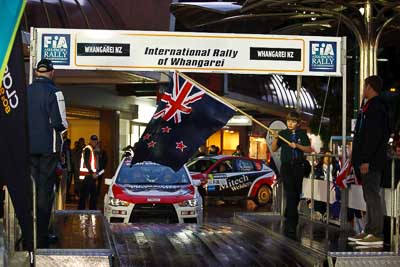 15-July-2011;APRC;Asia-Pacific-Rally-Championship;International-Rally-Of-Whangarei;NZ;New-Zealand;Northland;Rally;Whangarei;auto;ceremonial-start;ceremony;child;flag;garage;kid;motorsport;night;pre‒event;racing;start;telephoto