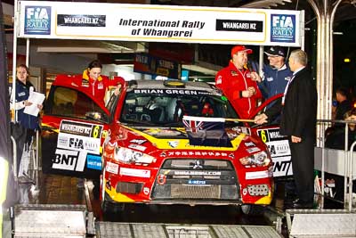 6;15-July-2011;6;APRC;Asia-Pacific-Rally-Championship;International-Rally-Of-Whangarei;Mitsubishi-Lancer-Evolution-X;NZ;New-Zealand;Northland;Rally;Richard-Mason;Sara-Mason;Soueast-Motor-Kumho-Team;Whangarei;auto;ceremonial-start;ceremony;garage;motorsport;pre‒event;racing;start;telephoto