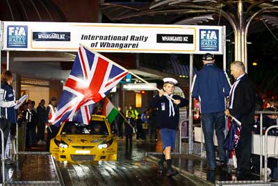 15-July-2011;APRC;Asia-Pacific-Rally-Championship;International-Rally-Of-Whangarei;NZ;New-Zealand;Northland;Rally;Topshot;Whangarei;auto;ceremonial-start;ceremony;child;flag;garage;kid;motorsport;night;pre‒event;racing;start;telephoto