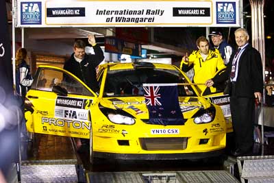 2;15-July-2011;2;APRC;Asia-Pacific-Rally-Championship;Chris-Atkinson;International-Rally-Of-Whangarei;NZ;New-Zealand;Northland;Proton-Motorsports;Proton-Satria-Neo-S2000;Rally;Stephane-Prevot;Whangarei;auto;ceremonial-start;ceremony;garage;motorsport;pre‒event;racing;start;telephoto