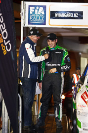 15-July-2011;APRC;Asia-Pacific-Rally-Championship;Hayden-Paddon;International-Rally-Of-Whangarei;NZ;New-Zealand;Northland;Rally;Whangarei;auto;ceremonial-start;ceremony;garage;motorsport;night;pre‒event;racing;start;telephoto