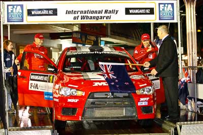 1;1;15-July-2011;APRC;Asia-Pacific-Rally-Championship;International-Rally-Of-Whangarei;Katsu-Taguchi;Mark-Stacey;Mitsubishi-Lancer-Evolution-X;NZ;New-Zealand;Northland;Rally;Team-MRF;Whangarei;auto;ceremonial-start;ceremony;garage;motorsport;pre‒event;racing;start;telephoto