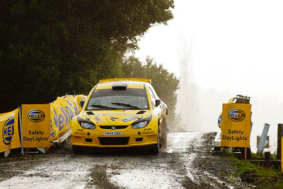 2;16-July-2011;2;APRC;Asia-Pacific-Rally-Championship;Chris-Atkinson;International-Rally-Of-Whangarei;NZ;New-Zealand;Northland;Proton-Motorsports;Proton-Satria-Neo-S2000;Rally;Stephane-Prevot;Whangarei;auto;garage;motorsport;racing;special-stage;super-telephoto