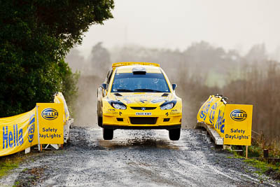 4;16-July-2011;4;APRC;Alister-McRae;Asia-Pacific-Rally-Championship;Bill-Hayes;International-Rally-Of-Whangarei;NZ;New-Zealand;Northland;Proton-Motorsports;Proton-Satria-Neo-S2000;Rally;Whangarei;auto;garage;motorsport;racing;special-stage;super-telephoto