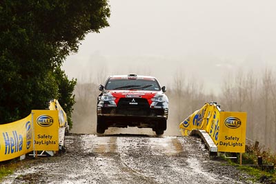 9;16-July-2011;9;APRC;Asia-Pacific-Rally-Championship;International-Rally-Of-Whangarei;NZ;New-Zealand;Northland;Pertamina-Cusco-Racing;Rally;Rifat-Sungkar;Scott-Beckwith;Whangarei;auto;garage;motorsport;racing;special-stage;super-telephoto