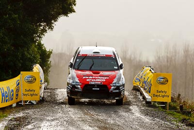 9;16-July-2011;9;APRC;Asia-Pacific-Rally-Championship;International-Rally-Of-Whangarei;NZ;New-Zealand;Northland;Pertamina-Cusco-Racing;Rally;Rifat-Sungkar;Scott-Beckwith;Whangarei;auto;garage;motorsport;racing;special-stage;super-telephoto