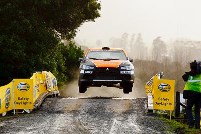 10;10;16-July-2011;APRC;Asia-Pacific-Rally-Championship;International-Rally-Of-Whangarei;Mitsubishi-Lancer-Evolution-X;NZ;New-Zealand;Northland;Rally;Sloan-Cox;Tarryn-Cox;Whangarei;auto;garage;motorsport;racing;special-stage;super-telephoto