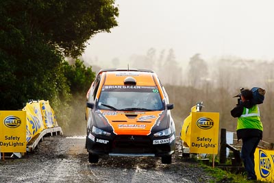 10;10;16-July-2011;APRC;Asia-Pacific-Rally-Championship;International-Rally-Of-Whangarei;Mitsubishi-Lancer-Evolution-X;NZ;New-Zealand;Northland;Rally;Sloan-Cox;Tarryn-Cox;Whangarei;auto;garage;motorsport;racing;special-stage;super-telephoto