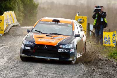 10;10;16-July-2011;APRC;Asia-Pacific-Rally-Championship;International-Rally-Of-Whangarei;Mitsubishi-Lancer-Evolution-X;NZ;New-Zealand;Northland;Rally;Sloan-Cox;Tarryn-Cox;Whangarei;auto;garage;motorsport;racing;special-stage;super-telephoto