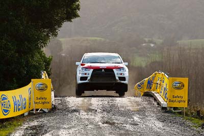 16;16;16-July-2011;APRC;Asia-Pacific-Rally-Championship;Brian-Green;Brian-Green-Motorsport;Fleur-Pedersen;International-Rally-Of-Whangarei;Mitsubishi-Lancer-Evolution-X;NZ;New-Zealand;Northland;Rally;Whangarei;auto;garage;motorsport;racing;special-stage;super-telephoto