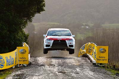 16;16;16-July-2011;APRC;Asia-Pacific-Rally-Championship;Brian-Green;Brian-Green-Motorsport;Fleur-Pedersen;International-Rally-Of-Whangarei;Mitsubishi-Lancer-Evolution-X;NZ;New-Zealand;Northland;Rally;Whangarei;auto;garage;motorsport;racing;special-stage;super-telephoto