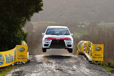 16;16;16-July-2011;APRC;Asia-Pacific-Rally-Championship;Brian-Green;Brian-Green-Motorsport;Fleur-Pedersen;International-Rally-Of-Whangarei;Mitsubishi-Lancer-Evolution-X;NZ;New-Zealand;Northland;Rally;Whangarei;auto;garage;motorsport;racing;special-stage;super-telephoto