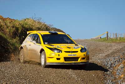 4;16-July-2011;4;APRC;Alister-McRae;Asia-Pacific-Rally-Championship;Bill-Hayes;NZ;New-Zealand;Northland;Proton-Motorsports;Proton-Satria-Neo-S2000;Rally;auto;garage;motorsport;racing;special-stage;telephoto