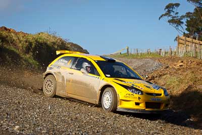 4;16-July-2011;4;APRC;Alister-McRae;Asia-Pacific-Rally-Championship;Bill-Hayes;International-Rally-Of-Whangarei;NZ;New-Zealand;Northland;Proton-Motorsports;Proton-Satria-Neo-S2000;Rally;Whangarei;auto;garage;motorsport;racing;special-stage;telephoto