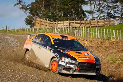 10;10;16-July-2011;APRC;Asia-Pacific-Rally-Championship;International-Rally-Of-Whangarei;Mitsubishi-Lancer-Evolution-X;NZ;New-Zealand;Northland;Rally;Sloan-Cox;Tarryn-Cox;Whangarei;auto;garage;motorsport;racing;special-stage;telephoto