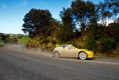 2;16-July-2011;2;APRC;Asia-Pacific-Rally-Championship;Chris-Atkinson;International-Rally-Of-Whangarei;NZ;New-Zealand;Northland;Proton-Motorsports;Proton-Satria-Neo-S2000;Rally;Stephane-Prevot;Whangarei;auto;garage;landscape;motorsport;racing;scenery;special-stage;wide-angle